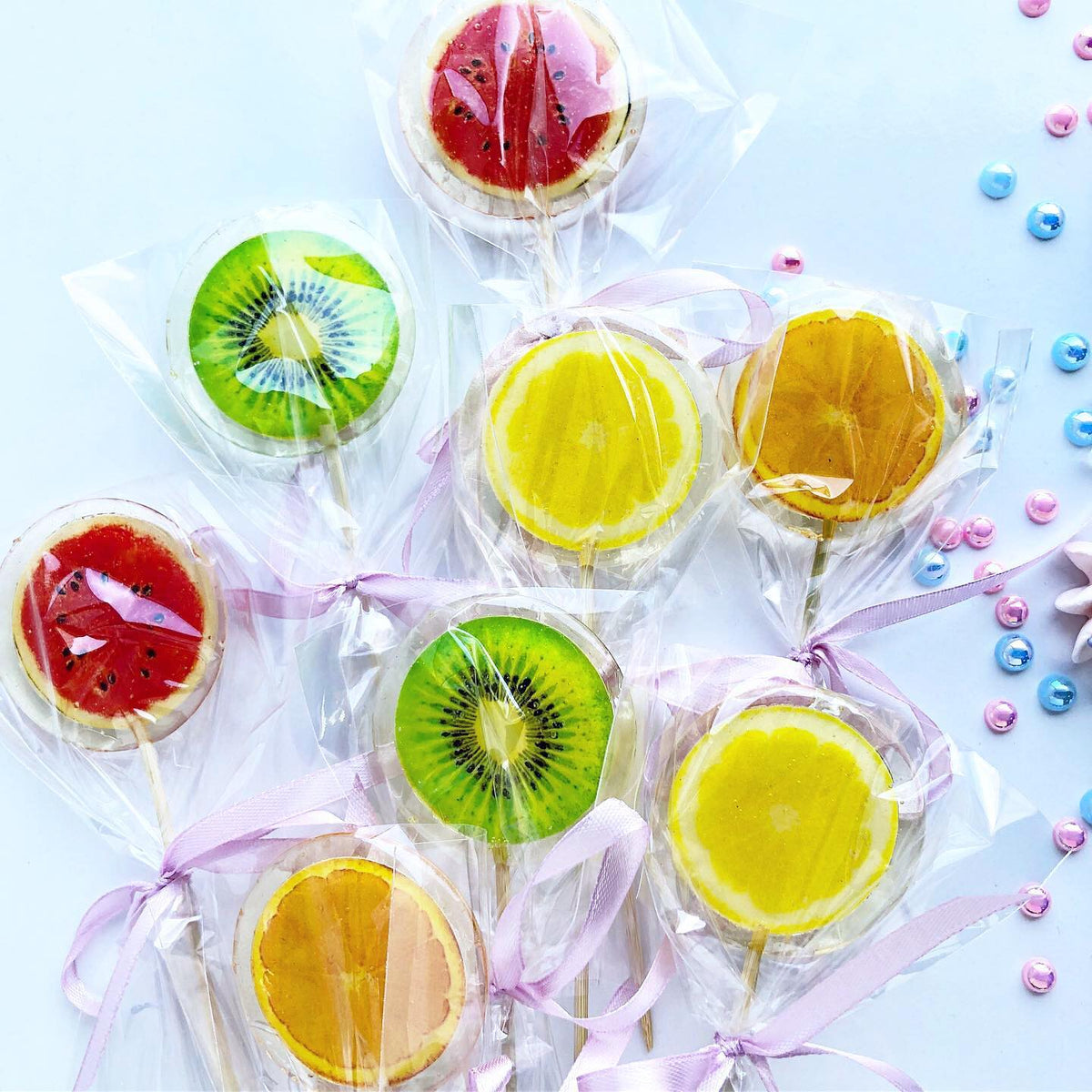 TEST sample: printed round lollipops with colourful fruit designs